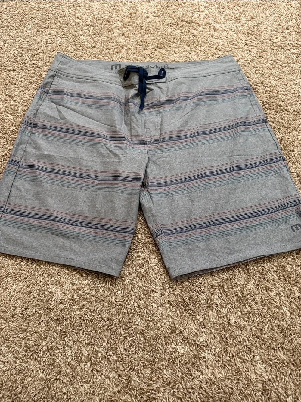 Travis Mathew Gray Board Shorts with Navy Drawcord and Subtle Multi-Stripe